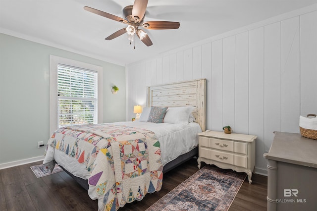 bedroom with ceiling fan, baseboards, and dark wood finished floors