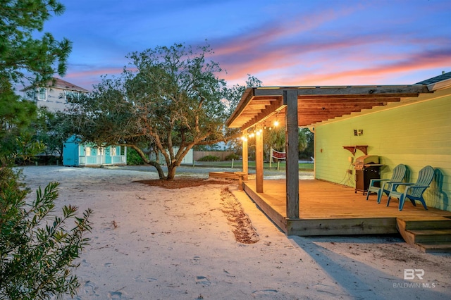 exterior space featuring a deck and a pergola