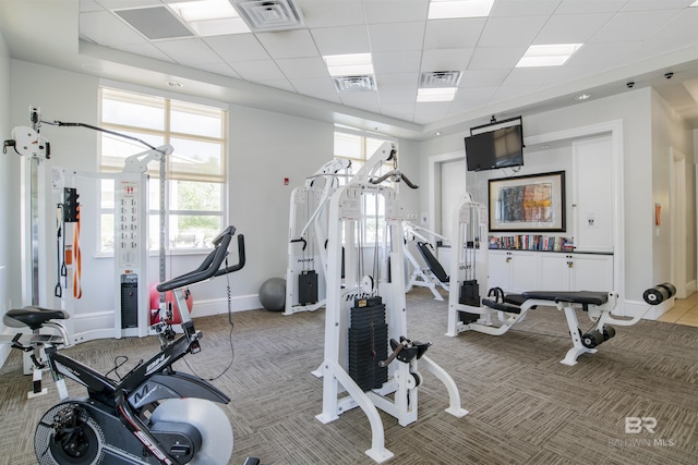 608 Lost Key Dr Unit 705C, Pensacola, FL 32507 - gym with baseboards, carpet, and a drop ceiling