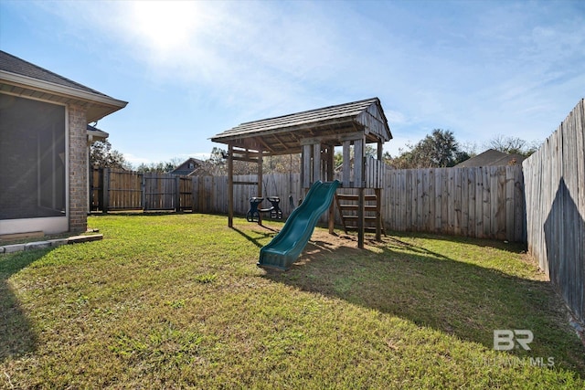 view of yard with a playground