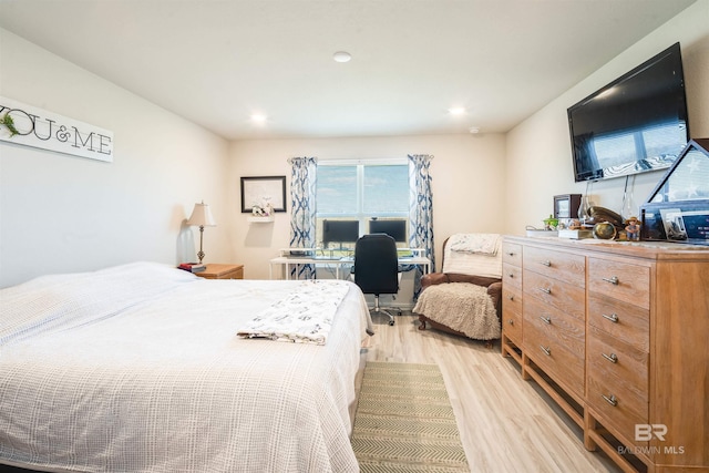 bedroom featuring light wood-style floors and recessed lighting