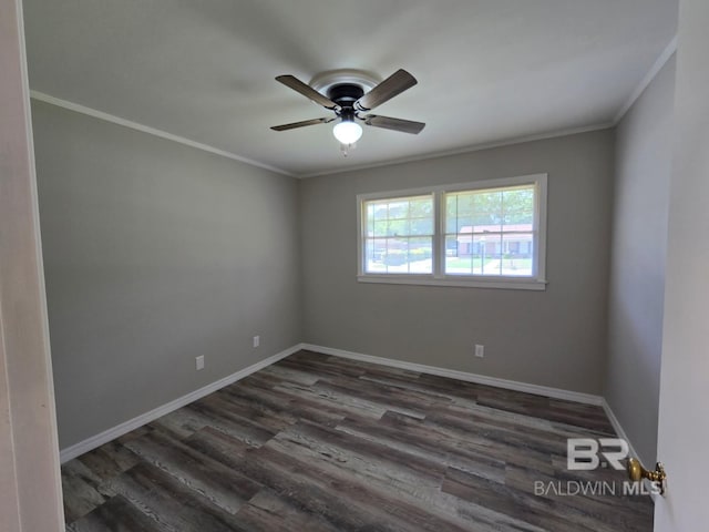 114 Spruce Ave, Brewton, AL 36426 - empty room featuring dark wood-type flooring, a ceiling fan, crown molding, and baseboards