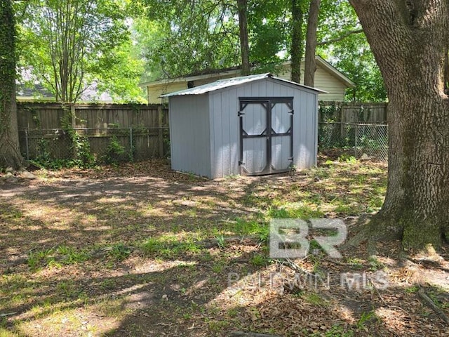 114 Spruce Ave, Brewton, AL 36426 - view of shed with a fenced backyard