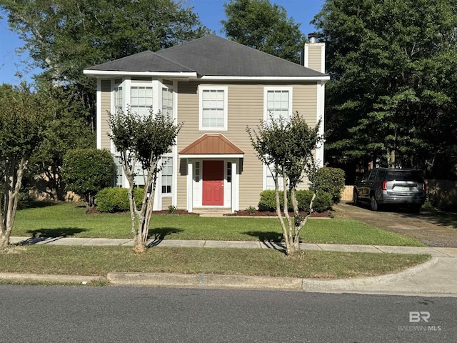2309 Crystal Ky, Mobile, AL 36695 - view of front of property featuring a chimney and a front lawn
