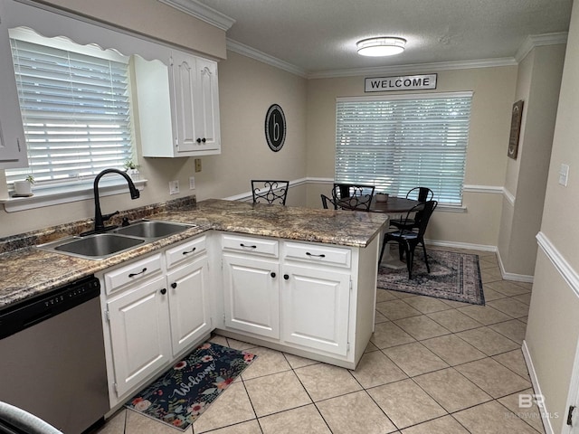 kitchen with a peninsula, white cabinetry, light tile patterned floors, a sink, and dishwasher