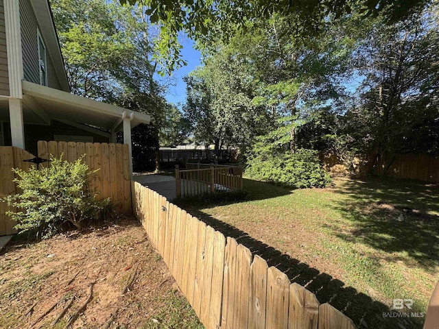 view of yard featuring a fenced backyard