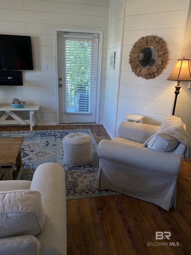 5781 State Highway 180 Unit 6006, Gulf Shores, AL 36542 - living area featuring wood finished floors and wooden walls
