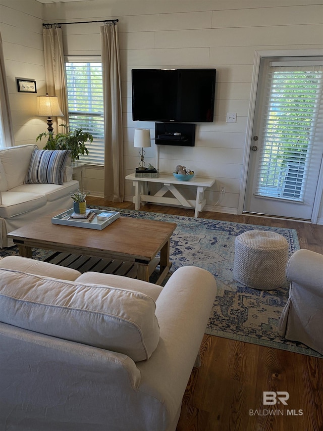 5781 State Highway 180 Unit 6006, Gulf Shores, AL 36542 - living room featuring wood finished floors and plenty of natural light