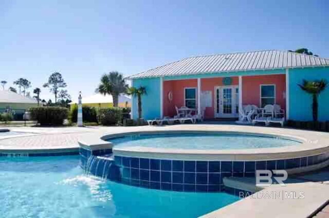 5781 State Highway 180 Unit 6006, Gulf Shores, AL 36542 - view of swimming pool with a pool with connected hot tub