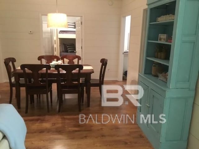 5781 State Highway 180 Unit 6006, Gulf Shores, AL 36542 - dining room featuring wood finished floors
