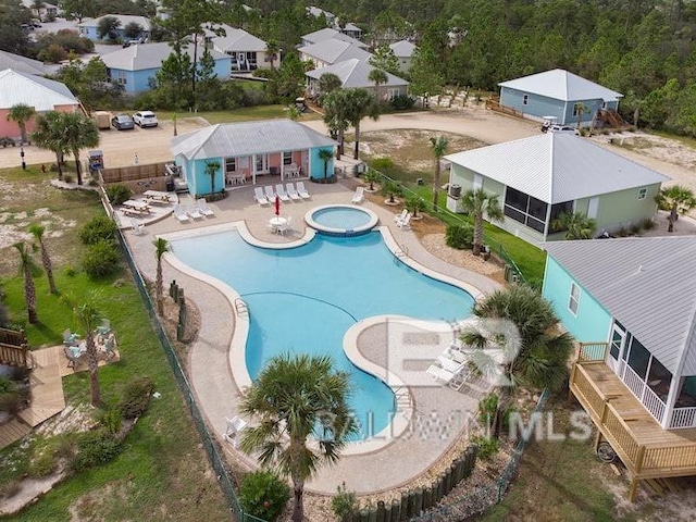 5781 State Highway 180 Unit 6006, Gulf Shores, AL 36542 - community pool featuring a hot tub and a patio