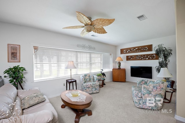 35788 Boykin Blvd, Lillian, AL 36549 - living room featuring carpet floors, plenty of natural light, a ceiling fan, and visible vents