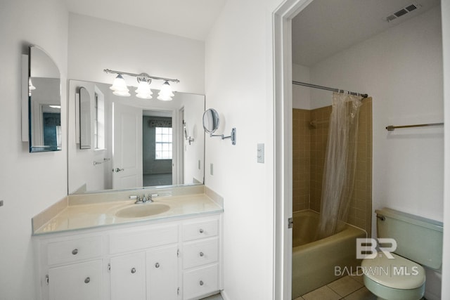 35788 Boykin Blvd, Lillian, AL 36549 - full bath featuring visible vents, vanity, toilet, shower / bathtub combination with curtain, and tile patterned floors