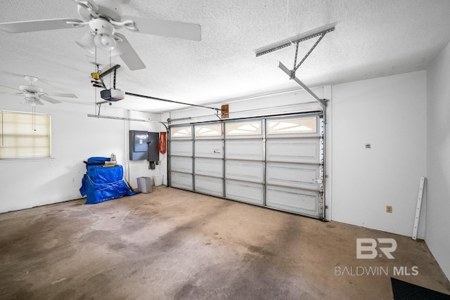35788 Boykin Blvd, Lillian, AL 36549 - garage with a garage door opener and a ceiling fan