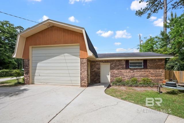 35788 Boykin Blvd, Lillian, AL 36549 - ranch-style house with brick siding, driveway, fence, and a garage