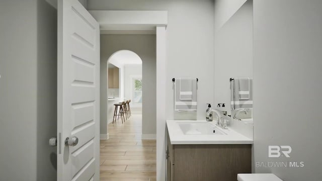 6158 Milo Loop, Gulf Shores, AL 36542 - bathroom featuring vanity and wood finished floors