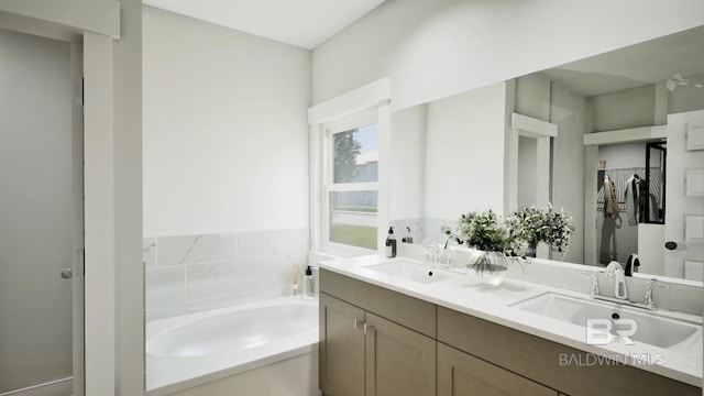 6158 Milo Loop, Gulf Shores, AL 36542 - full bathroom with a garden tub and double vanity