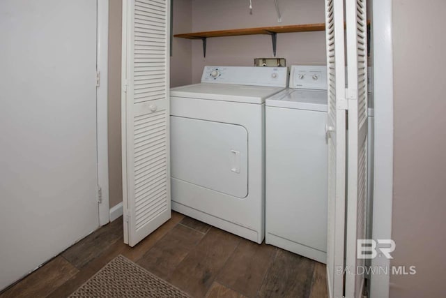 washroom featuring dark hardwood / wood-style flooring and separate washer and dryer