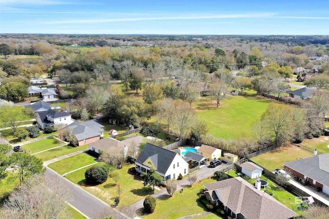 birds eye view of property with a residential view