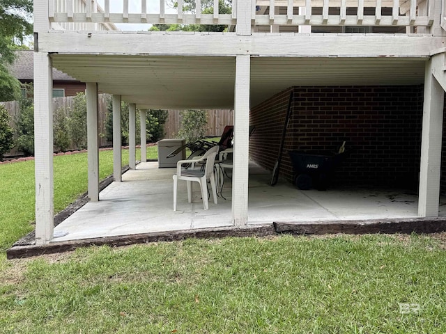 view of patio featuring fence