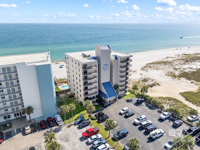 drone / aerial view with a view of the beach and a water view