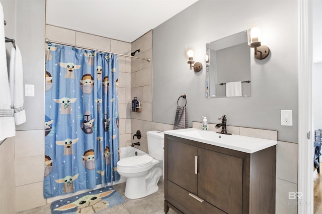 bathroom featuring tile patterned floors, vanity, toilet, and shower / tub combo with curtain