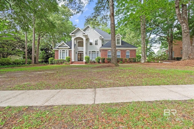 9330 Timbercreek Blvd, Daphne, AL 36527 - traditional-style home with brick siding and a front lawn
