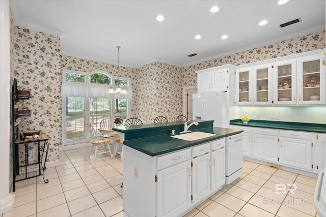 9330 Timbercreek Blvd, Daphne, AL 36527 - kitchen featuring ornamental molding, a sink, white appliances, dark countertops, and a chandelier