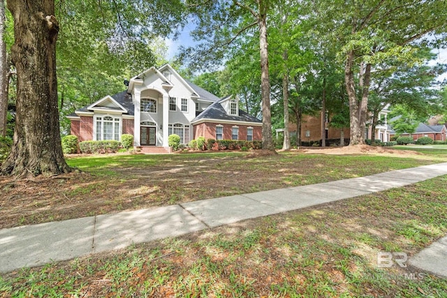 9330 Timbercreek Blvd, Daphne, AL 36527 - view of front facade with brick siding and a front yard