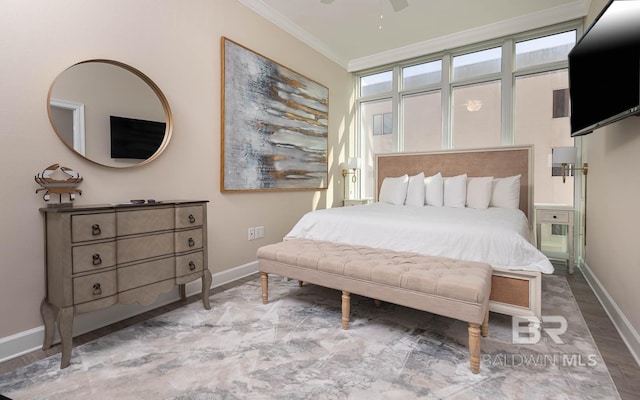 bedroom with crown molding, multiple windows, and ceiling fan