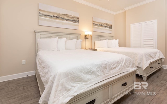 bedroom with dark wood-type flooring and ornamental molding