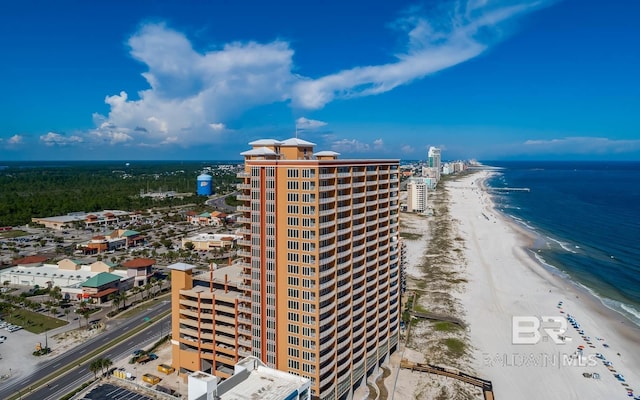 exterior space featuring a view of the beach and a water view