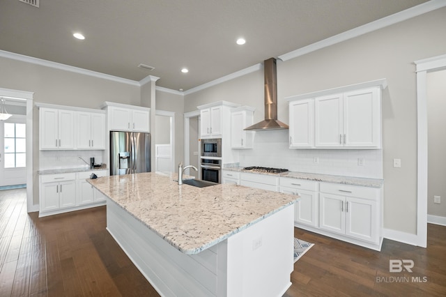 9377 Diamante Blvd, Daphne, AL 36526 - kitchen featuring an island with sink, wall chimney exhaust hood, visible vents, a sink, and stainless steel appliances