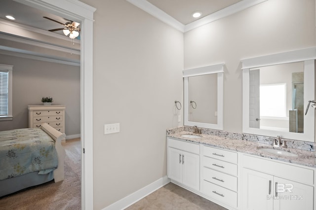 9377 Diamante Blvd, Daphne, AL 36526 - full bath with double vanity, a ceiling fan, a sink, and ornamental molding