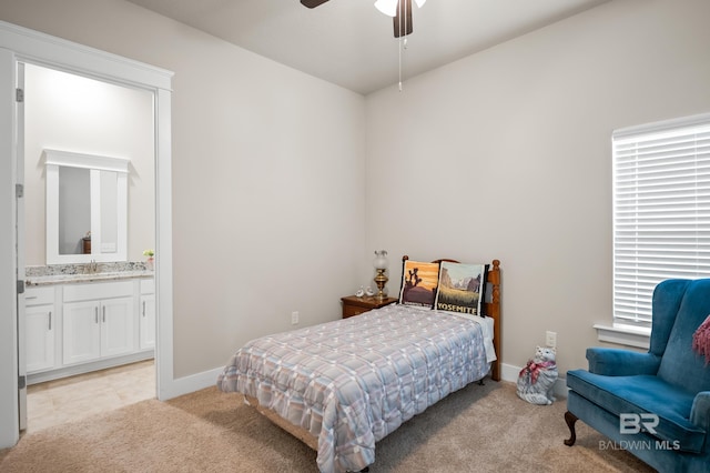 9377 Diamante Blvd, Daphne, AL 36526 - bedroom featuring baseboards, ensuite bathroom, ceiling fan, light colored carpet, and a sink
