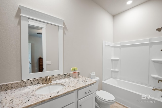 9377 Diamante Blvd, Daphne, AL 36526 - bathroom with toilet, vanity, and  shower combination