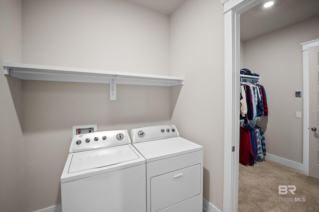 9377 Diamante Blvd, Daphne, AL 36526 - washroom with baseboards, separate washer and dryer, laundry area, and light carpet