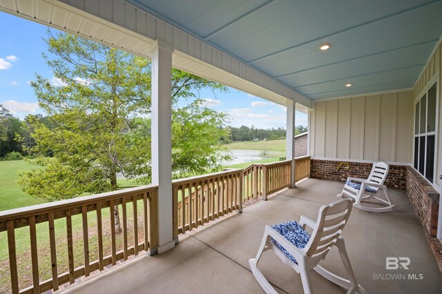 9377 Diamante Blvd, Daphne, AL 36526 - view of patio / terrace with a porch