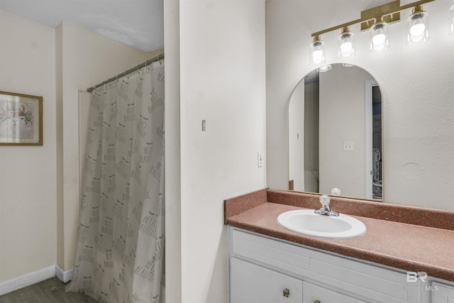221 Howard Cir, Gulf Shores, AL 36542 - bathroom featuring vanity and curtained shower