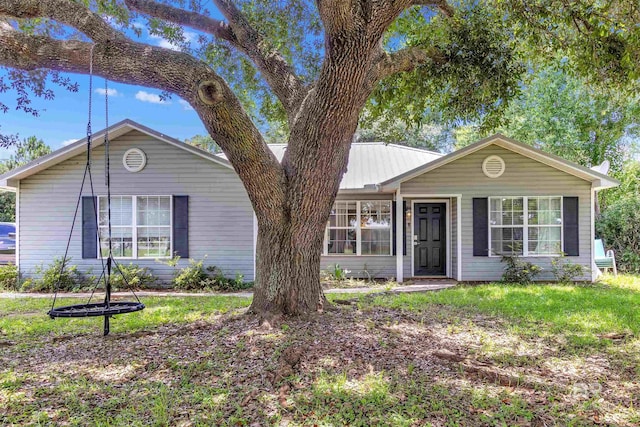 221 Howard Cir, Gulf Shores, AL 36542 - single story home with a metal roof