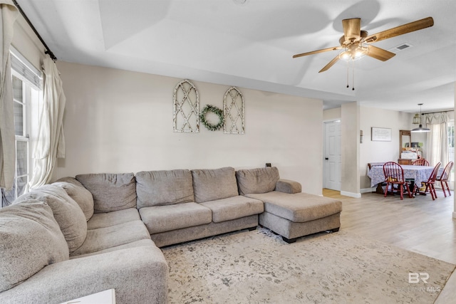 221 Howard Cir, Gulf Shores, AL 36542 - living area featuring ceiling fan and light wood-style floors