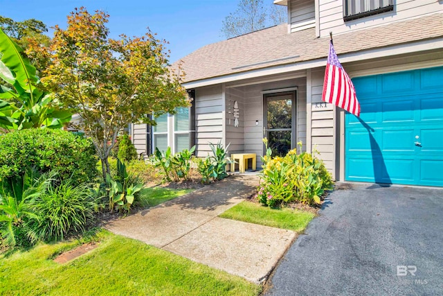 property entrance featuring a garage