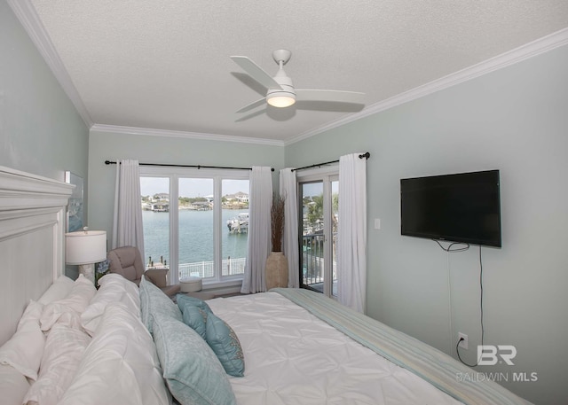 bedroom with ornamental molding, a textured ceiling, access to outside, and ceiling fan