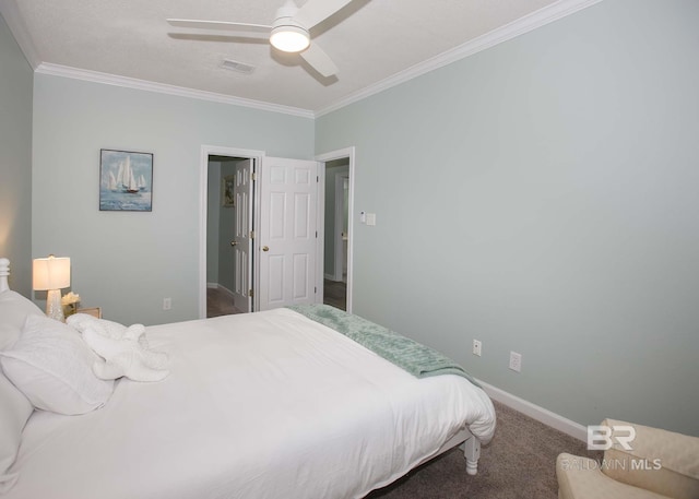 carpeted bedroom with crown molding and ceiling fan