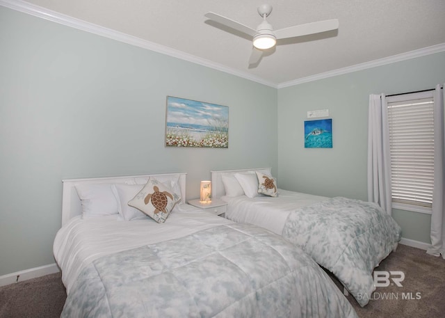 carpeted bedroom with ornamental molding and ceiling fan