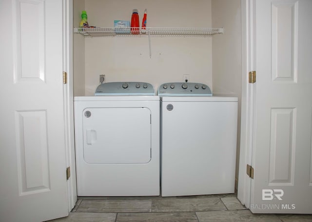 laundry area with washer and dryer