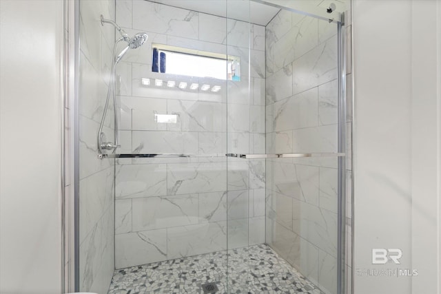 full bathroom featuring a stall shower