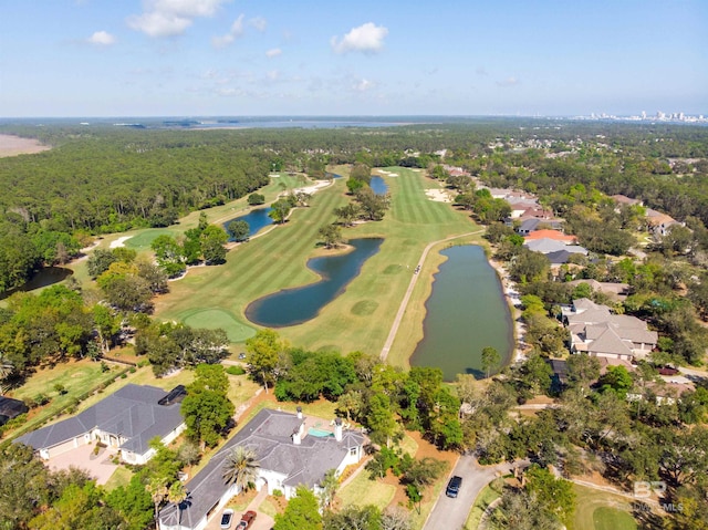 bird's eye view with view of golf course, a residential view, a water view, and a view of trees