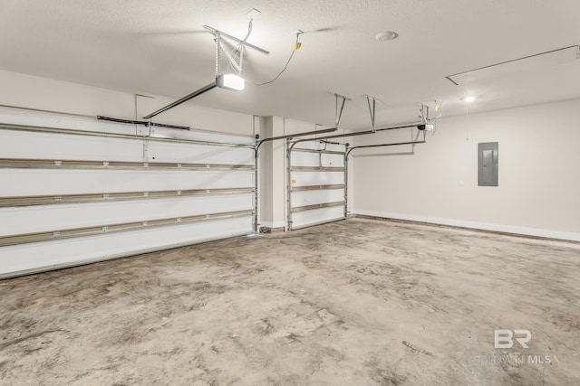 garage with baseboards, electric panel, and a garage door opener