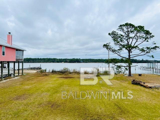 view of yard with a water view